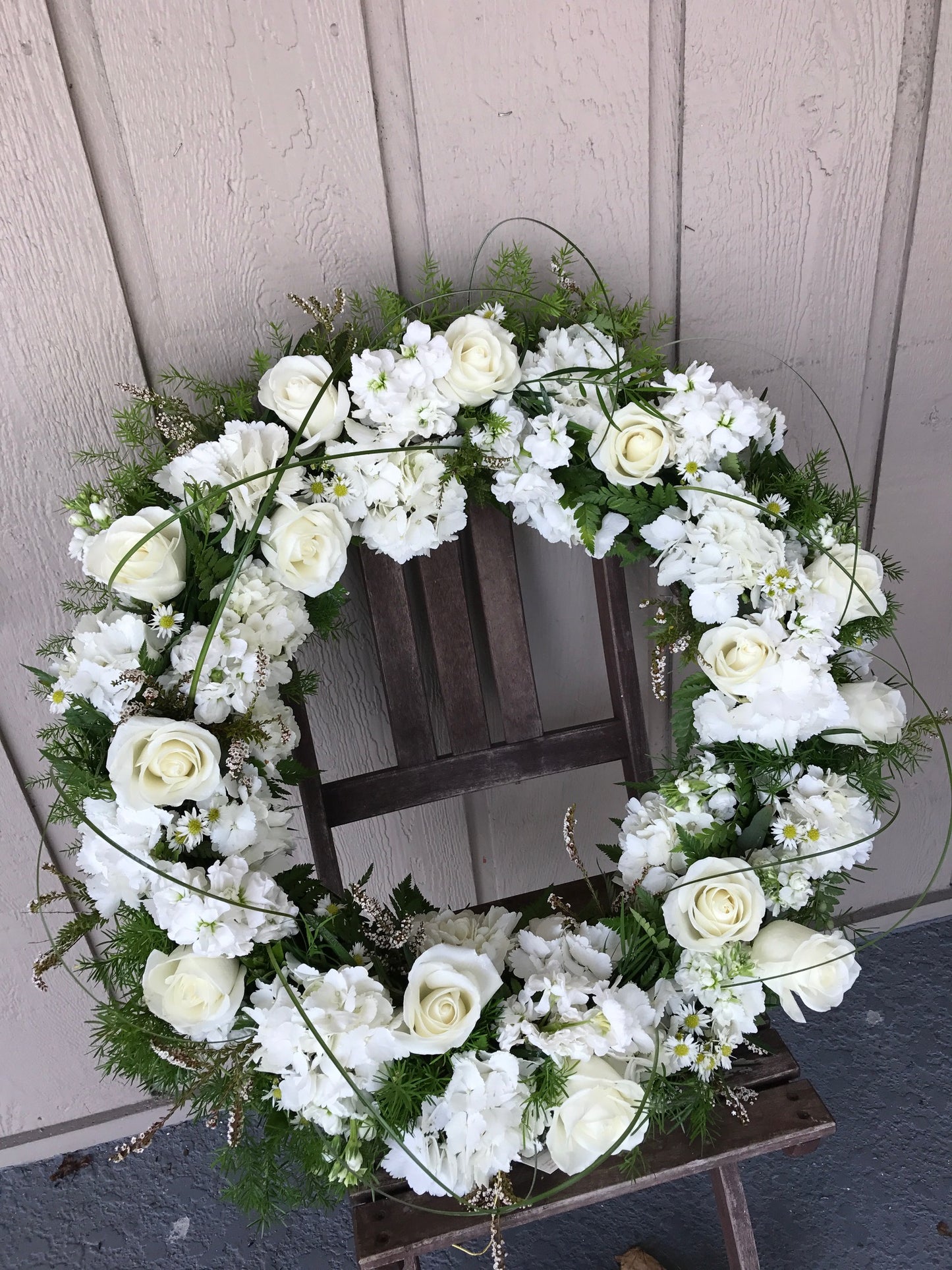 Heavenly Tribute Sympathy Arrangement with Angel Keepsake